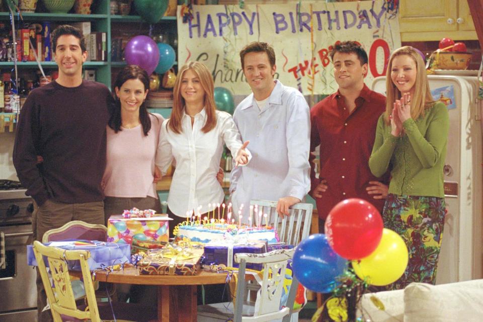 David Schwimmer, Courteney Cox, Jennifer Aniston, Matthew Perry, Matt LeBlanc and Lisa Kudrow are pictured on the set of 'The One where They All Turn Thirty', the 14th episode of the seventh episode of Friends, which aired in 2001. ((Photo by Warner Bros Television))