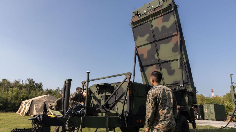 U.S. Marine Corps aviation radar technicians with Marine Air Control Squadron (MACS) 4 prepare the AN/TPS-80 Ground and Air Task Oriented Radar (G/ATOR) system for operation during Ryukyu Shield 24 at Naval Base White Beach, Okinawa, Japan, Dec. 7, 2023. (Cpl. Emily Weiss/US Marine Corps)