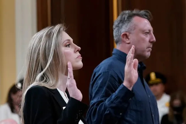 U.S. Capitol Police officer Caroline Edwards, left, and British filmmaker Nick Quested are sworn in as the House select committee investigating the Jan. 6, 2021, attack on the U.S. Capitol holds its first public hearing Thursday. (Photo: J. Scott Applewhite/Associated Press)