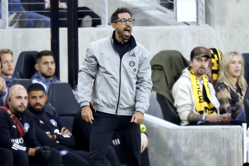 CF Montreal coach Hernan Losada directs his team against the Columbus Crew during the first half of an MLS soccer match in Columbus, Ohio, Saturday, Oct. 21, 2023. The Crew won 2-1. (AP Photo/Paul Vernon)