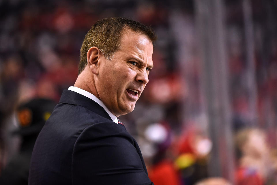 CALGARY, AB - NOVEMBER 30: Calgary Flames assistant general manager Craig Conroy watches his team warm up before an NHL game where the Calgary Flames hosted the Ottawa Senators on November 30, 2019, at the Scotiabank Saddledome in Calgary, AB. (Photo by Brett Holmes/Icon Sportswire via Getty Images)