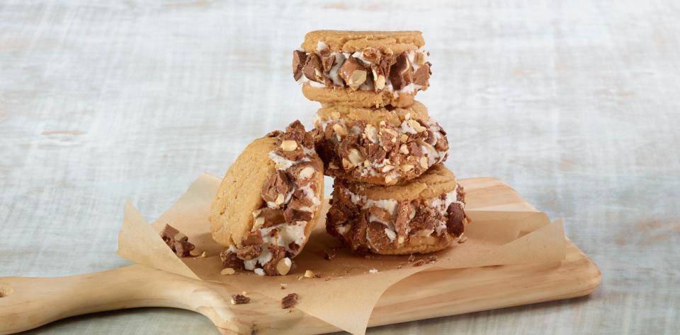 <p>This cookie sandwich recipe uses yummy <a href="https://www.thedailymeal.com/eat/most-searched-ice-cream-america?referrer=yahoo&category=beauty_food&include_utm=1&utm_medium=referral&utm_source=yahoo&utm_campaign=feed" rel="nofollow noopener" target="_blank" data-ylk="slk:vanilla ice cream;elm:context_link;itc:0;sec:content-canvas" class="link ">vanilla ice cream</a> between two peanut butter cookies and chunks of Baby Ruth candies on the outside.</p> <p><a href="https://www.thedailymeal.com/recipe/baby-ruth-caramel-cookie-sandwich?referrer=yahoo&category=beauty_food&include_utm=1&utm_medium=referral&utm_source=yahoo&utm_campaign=feed" rel="nofollow noopener" target="_blank" data-ylk="slk:For the Baby Ruth Salted Caramel Cookie Sandwiches recipe, click here.;elm:context_link;itc:0;sec:content-canvas" class="link ">For the Baby Ruth Salted Caramel Cookie Sandwiches recipe, click here.</a></p>