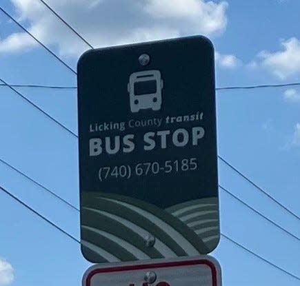 Licking County Transit bus stop sign, the location where riders should wait at one of 25 stops along East Main and West Main streets in Newark.