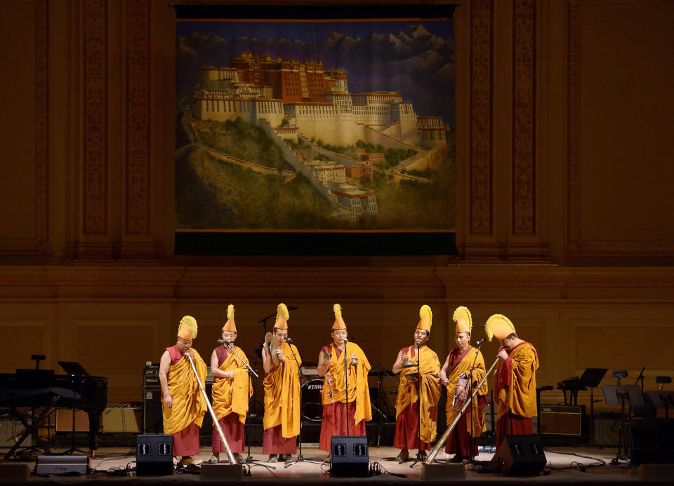 Buddhist monks chant at the 24th Annual Tibet House U.S. benefit concert at Carnegie Hall on Tuesday, March 11, 2014 in New York. (Photo by Evan Agostini/Invision/AP)