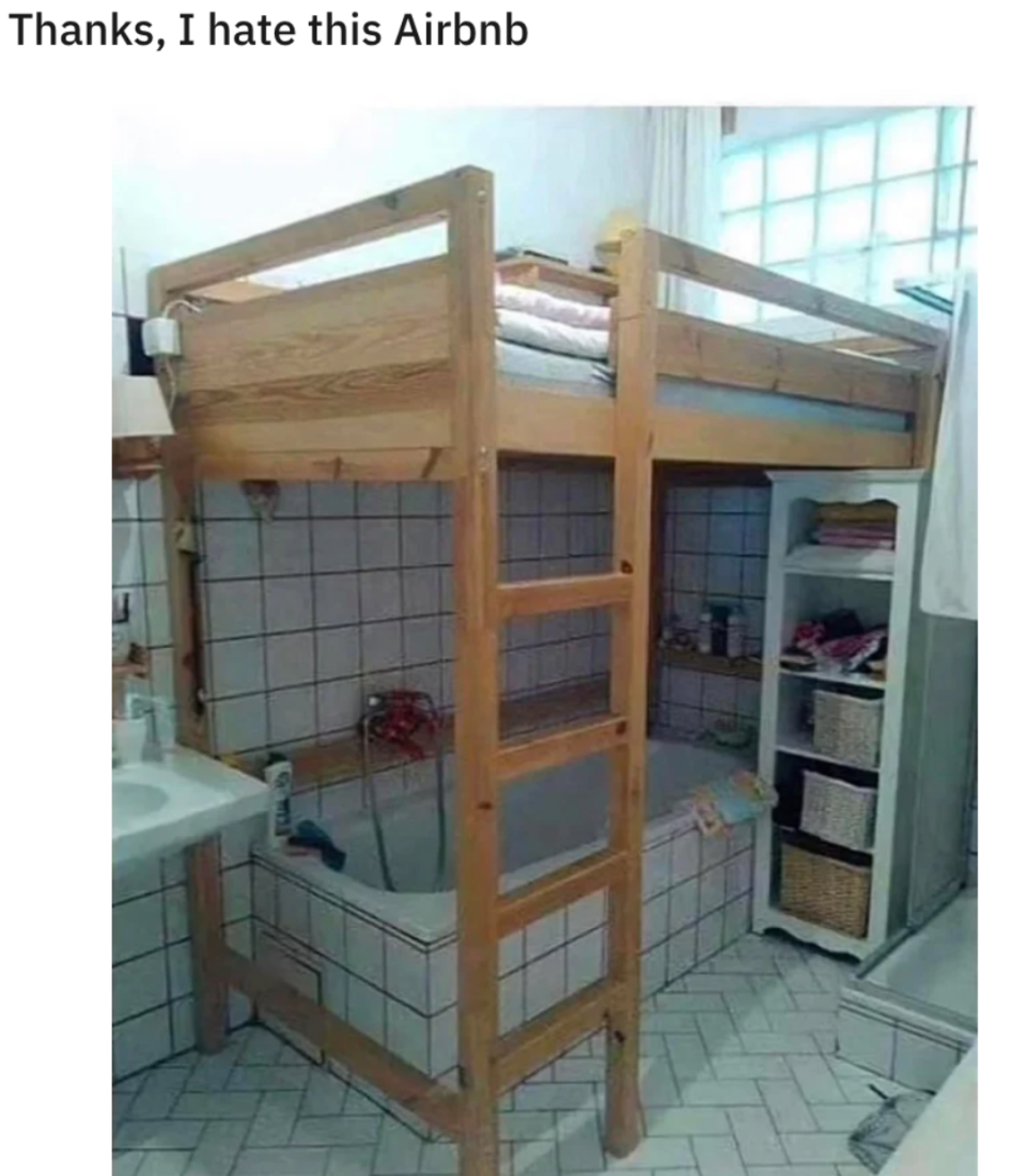A bunk bed over a bathtub