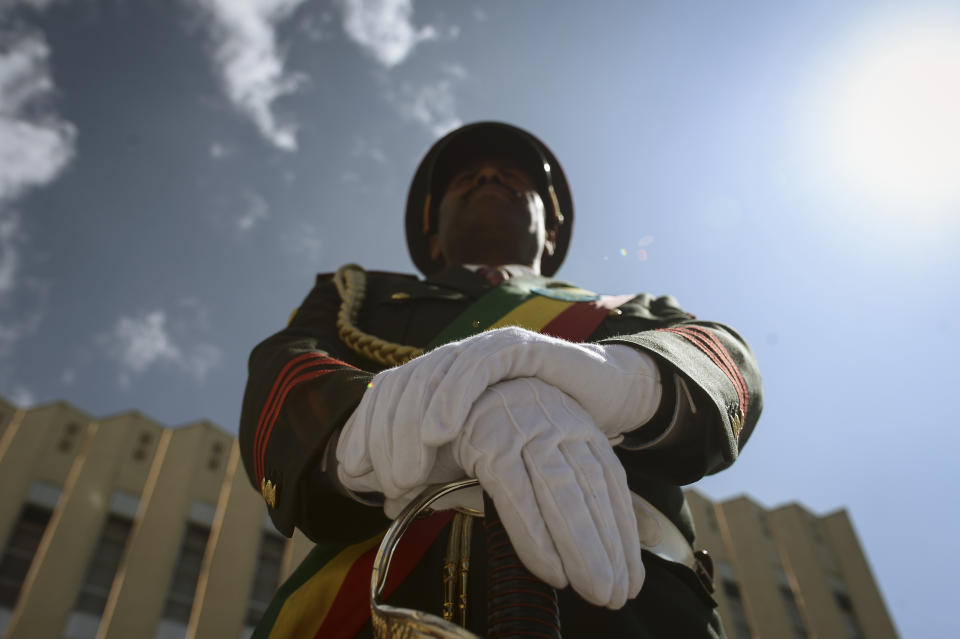 A member of a military marching band attends a ceremony to remember those soldiers who died on the first day of the Tigray conflict, outside the city administration office in Addis Ababa, Ethiopia Thursday, Nov. 3, 2022. Ethiopia's warring sides agreed Wednesday to a permanent cessation of hostilities in a conflict believed to have killed hundreds of thousands, but enormous challenges lie ahead, including getting all parties to lay down arms or withdraw. (AP Photo)