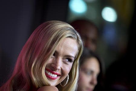 Model Petra Nemcova arrives for the Barbie Celebrates 50th Anniversary of Sports Illustrated Swimsuit Issue party in New York, February 17, 2014. REUTERS/Carlo Allegri