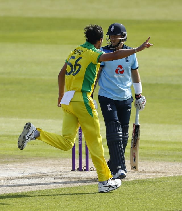 Mitchell Starc celebrates the dismissal of Joe Root 