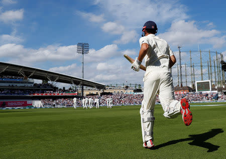 Cricket - England v India - Fifth Test - Kia Oval, London, Britain - September 9, 2018 England's Alastair Cook enters the field Action Images via Reuters/Paul Childs