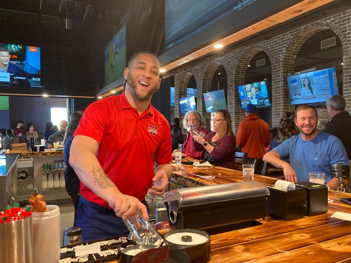 Chauncey Shaw prepares a cocktail at the new Walk-On’s Sports Bistreaux at 1070 Ga. 96 near Rigby’s Water World and Rigby’s Entertainment Complex in Warner Robins.