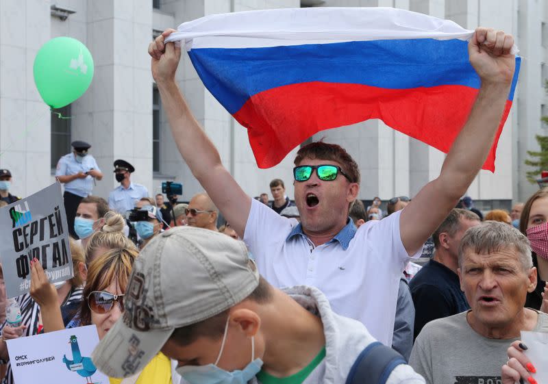 People take part in a rally in support of former regional governor Sergei Furgal in Khabarovsk