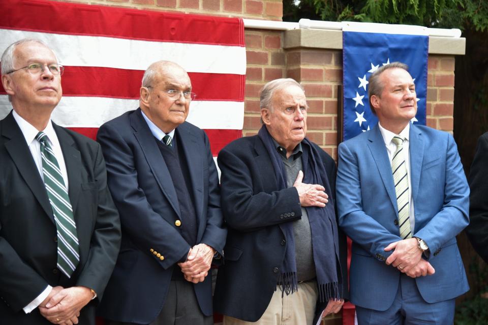 Pictured from left at the dedication of the Western Reserve Academy's Alumni War Memorial are Martin D. Franks, Harrison “Hub” Bubb, Dr. Loren Raymond and Christopher Bach.