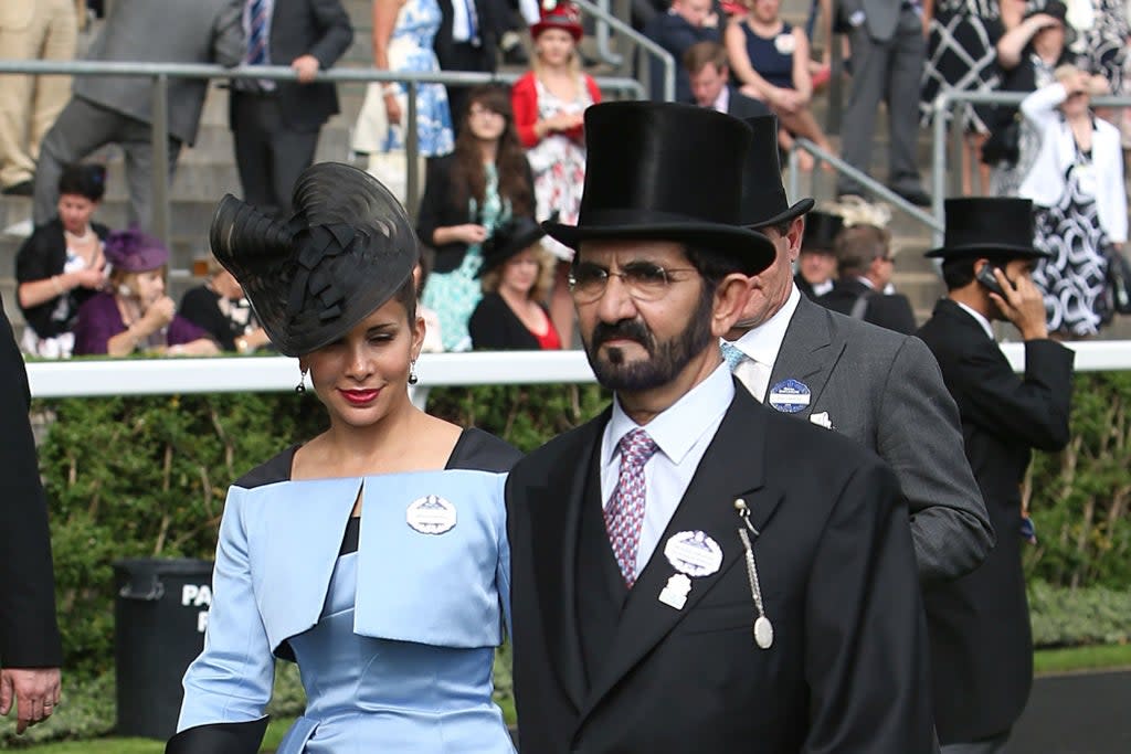 Sheikh Mohammed bin Rashid al-Maktoum with Princess Haya bint al-Hussein during Ladies’ Day at Royal Ascot in 2013  (PA)