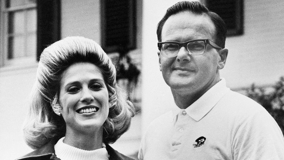 Lamar and Norma Hunt stand in front of their Dallas, Texas, home in June 1970. The couple was passionate about sports, and also owned a soccer team in the city. - Fred Kaufman/AP