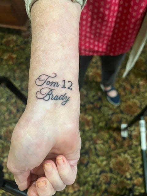 Marigrace Larabee getting a Tom Brady tribute tattoo from artist Dana Morse over at Pleasure in Pain Custom Tattoo in Taunton.