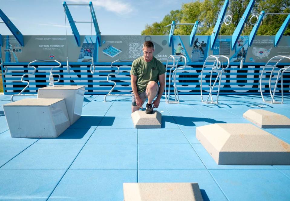 Patton Township police Sgt. Brian Shaffer demonstrates some of the features of the new FitCourt at Bernel Road Park on Tuesday, May 21, 2024.