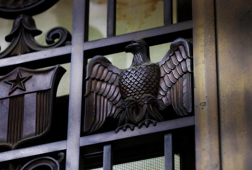 Bronze grills cover the windows above the downtown Fort Worth post office lobby windows as seen on Friday, Aug. 16, 2024.