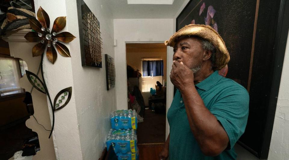 Cahokia Heights resident Lonnie Greenwood pauses in the hallway of his home after showing BND journalists the mold and damages left behind after decades of flooding with sewage-contaminated water.