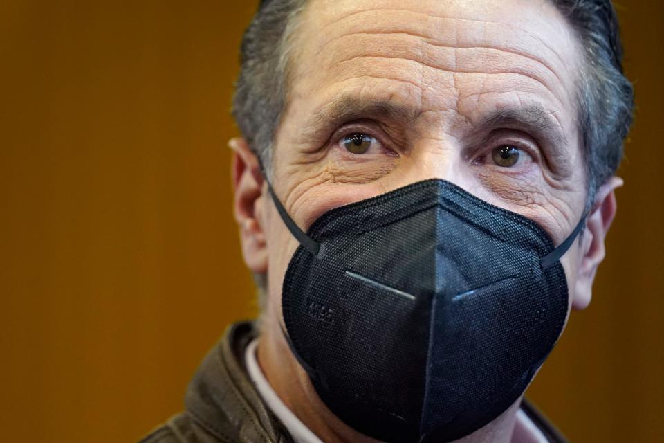 New York Gov. Andrew Cuomo walks through a COVID-19 vaccination site after speaking in the Brooklyn borough of New York, Monday, Feb. 22, 2021. (AP Photo/Seth Wenig, Pool)