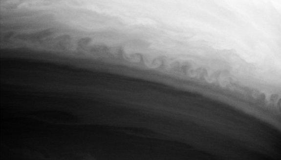 Here, the iconic waves appear on Saturn.