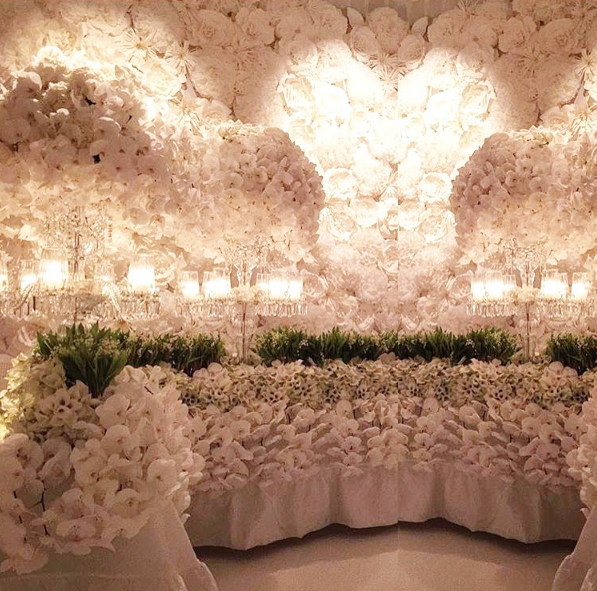 Inside the reception, every inch was covered in orchids, roses, lilies, and other white flowers. 