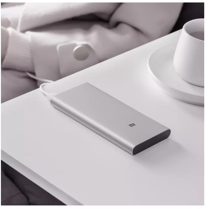 A product image of a XIAOMl Mi 10000mAh Gen 3 Powerbank on a table.