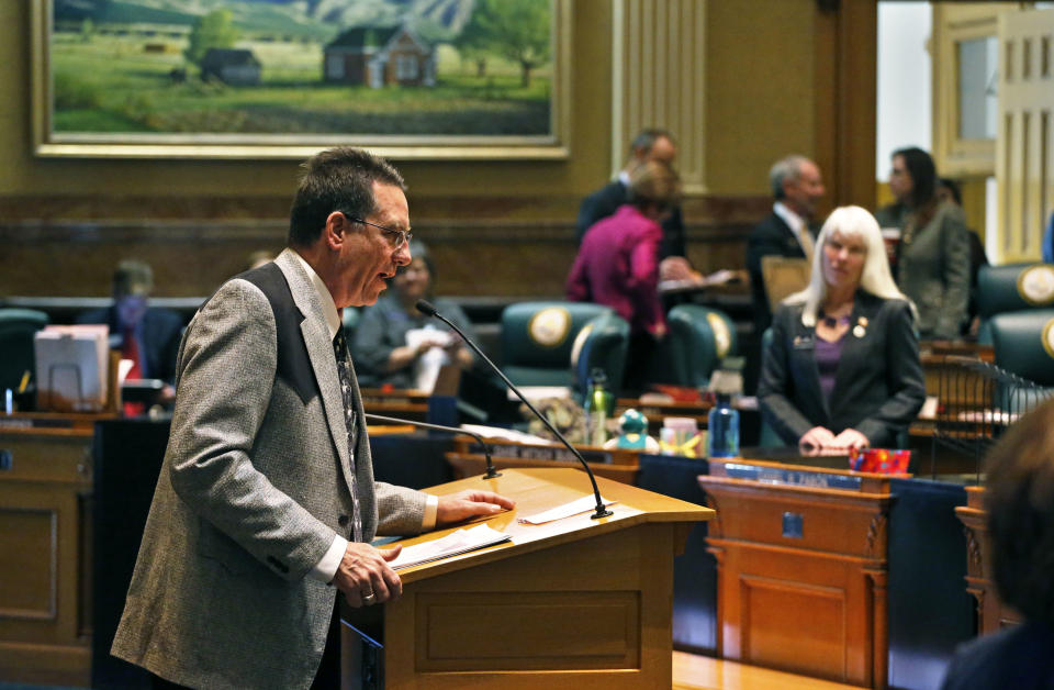 In this Jan. 22, 2014 photo, Colorado state representative Jerry Sonnenberg (R-Sterling) speaks at the podium inside the chambers of the Colorado State Legislature, at the Capitol, in Denver. Sonnenberg, a rancher who’s the only farmer in the Colorado House, plans to push a radical idea this session: give each of his state’s 64 counties one House seat apiece instead of electing representatives from districts with equal populations. (AP Photo/Brennan Linsley)