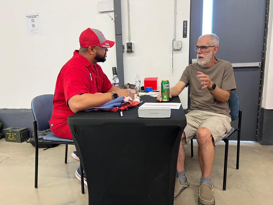 From left, SPARK! Creative Lab artist Angel Little, left, and Neil Chapman collaborate for the artist collective's new project "Ditty Bops: The Art of Listening."