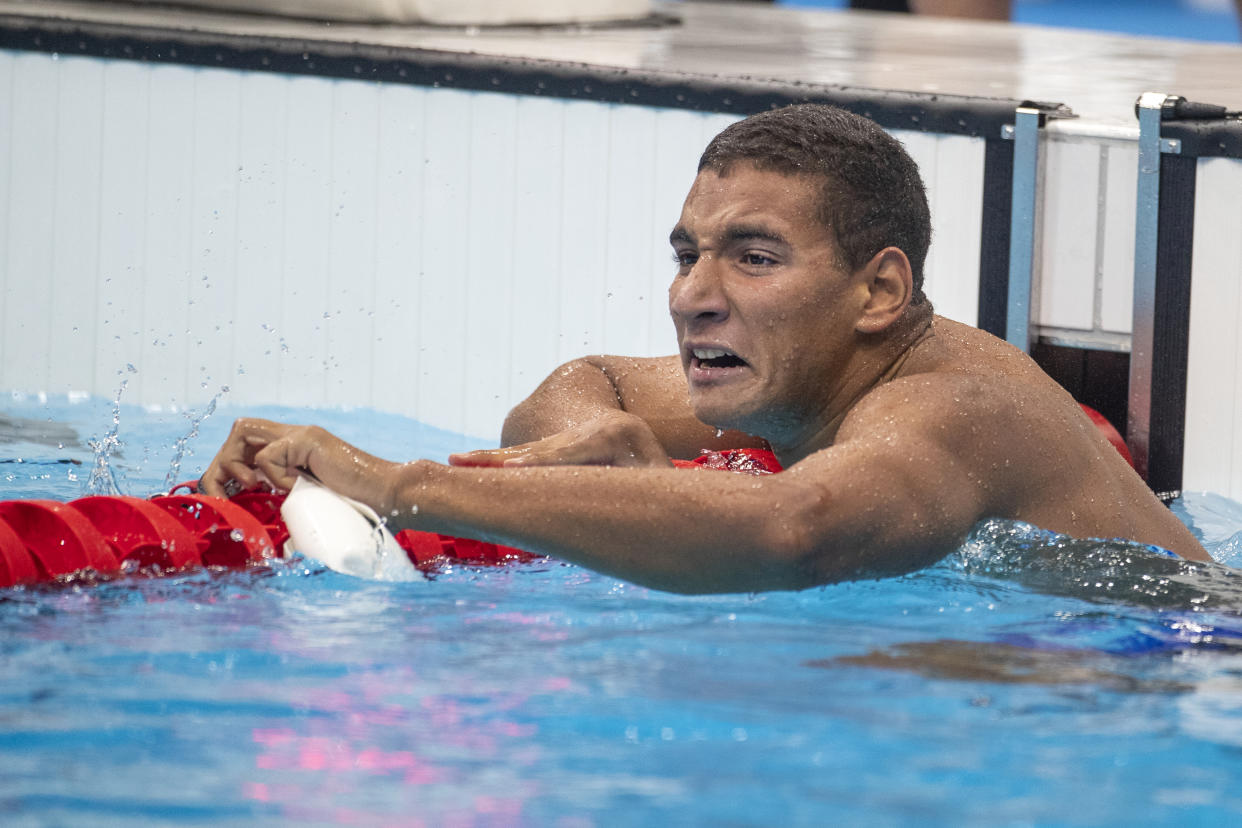 TOKYO, JAPAN - JULY 25: Ahmed Hafnaoui of Tunisia celebrates winning the gold medal in the 400m freestyle for men final during the Swimming Finals at the Tokyo Aquatic Centre at the Tokyo 2020 Summer Olympic Games on July 25, 2021 in Tokyo, Japan. (Photo by Tim Clayton/Corbis via Getty Images)