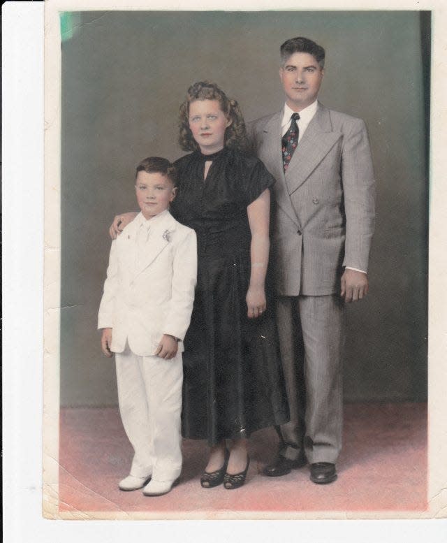 Tony La Spina with his parents at his first Communion in 1954.