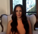 <p>For her stint in the moderator's seat while <a href="https://www.harpersbazaar.com/celebrity/latest/a33609254/meghan-markle-the-19th-interview/" rel="nofollow noopener" target="_blank" data-ylk="slk:interviewing The 19th*'s Emily Ramshaw;elm:context_link;itc:0;sec:content-canvas" class="link ">interviewing The 19th*'s Emily Ramshaw</a>, Meghan wore a bright orange blouse by Hugo Boss and bracelets by Cartier and Monica Vinader. </p>