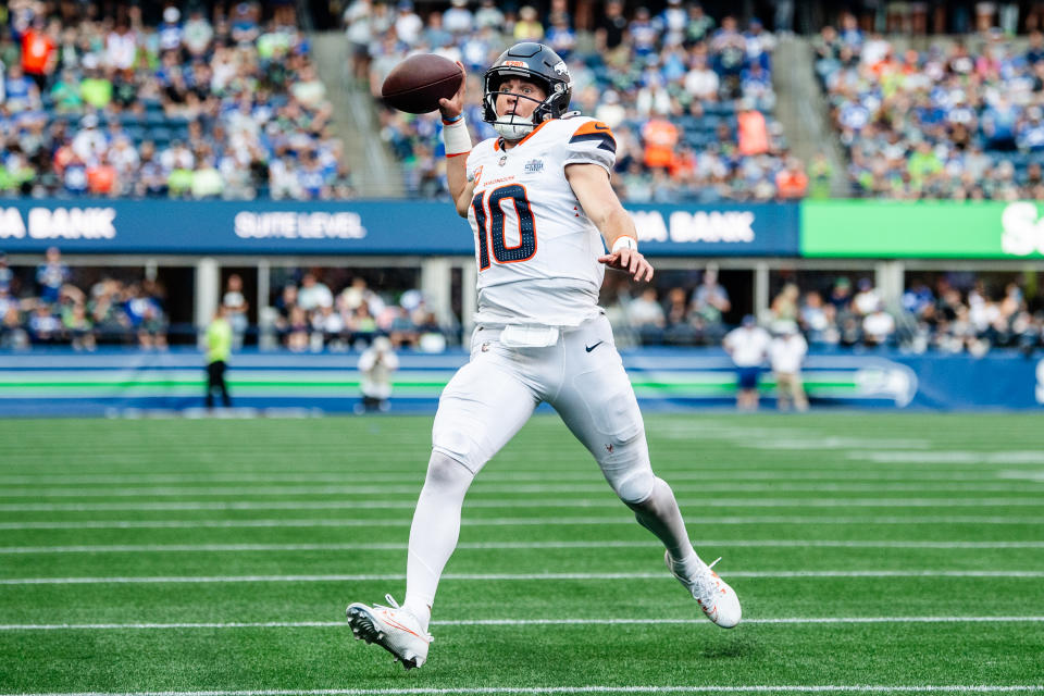 SEATTLE, WASHINGTON - SEPTEMBER 08: Bo Nix #10 of the Denver Broncos looks for a pass during the fourth quarter of the game against the Seattle Seahawks at Lumen Field on September 08, 2024 in Seattle, Washington. (Photo by Jane Gershovich/Getty Images)