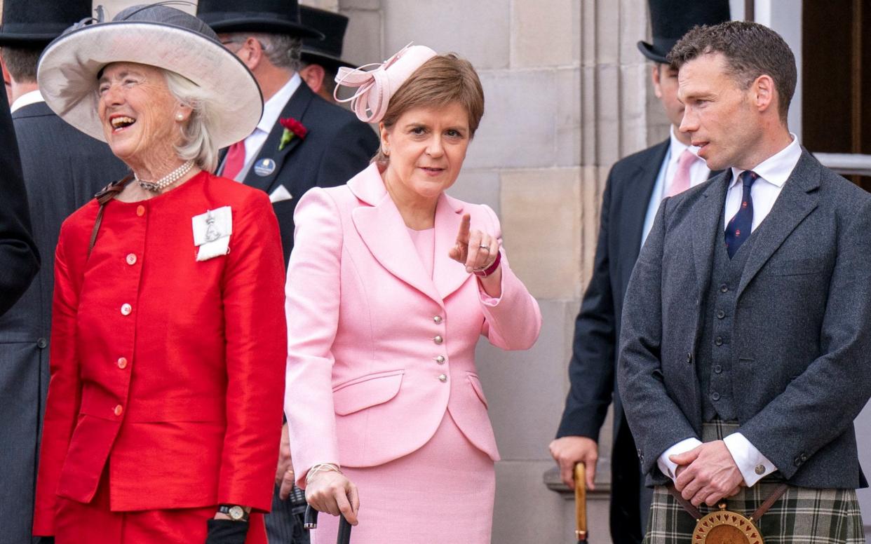 Nicola Sturgeon speaks during a garden party at the Palace of Holyroodhouse in Edinburgh yesterday - Reuters