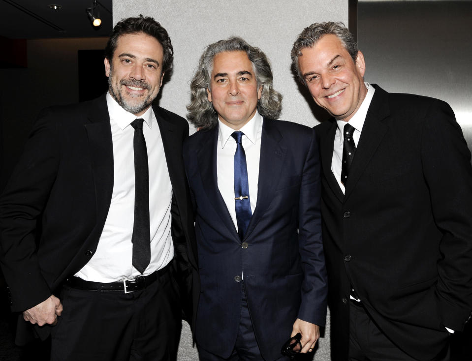 FILE - In this March 22, 2012 file photo, actor Jeffrey Dean Morgan, left, poses with writer, creator and executive producer Mitch Glazer and actor Danny Huston, right, pose at the premiere of the Starz original series "Magic City" at The Academy Theater at Lighthouse International in New York. The series captures the fast life of Miami Beach fueled by the Rat Pack, the mob, the CIA and anti-Castro forces coalescing after Fidel Castro's rise to power in Cuba. (AP Photo/Evan Agostini, file)