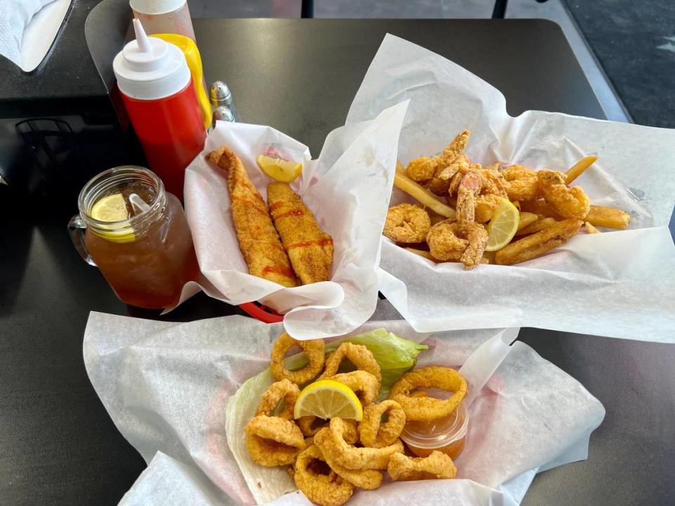 Try Seafood Grill is in Cary’s Tryon Woods Shopping Center and offers land and seafood options. Pictured here are the 8-piece jumbo shrimp combo with fries, two pieces of fried catfish, buttermilk calamari rings, and Arnold Palmer.