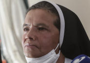 FILE — Colombian nun Gloria Cecilia Narvaez, who was held captive for nearly five years by al-Qaida-linked militants, listens to a question during a press conference in Bogota, Colombia, Friday, Nov. 19, 2021. The Vatican’s sprawling financial trial may not have produced any convictions yet or any new smoking guns. But recent testimony in May 2022 has provided plenty of insights into how the Vatican operates. (AP Photo/Ivan Valencia, File)