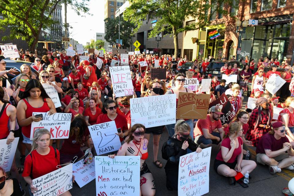 Hundreds block a portion of Phillips Avenue downtown to protest the overturning of Roe v. Wade on Wednesday, June 29, 2022, in Sioux Falls.