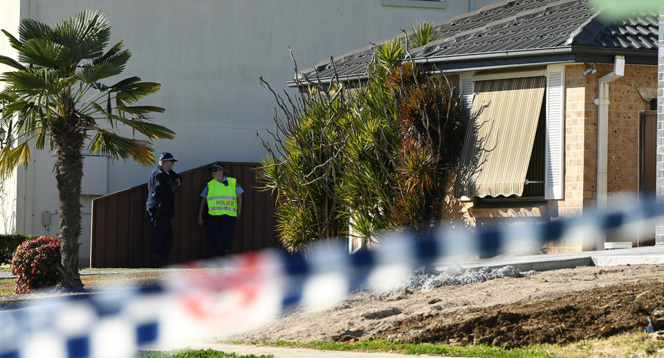 NSW Police establish a crime scene at a home at St Clair in Sydney, in 2019. 