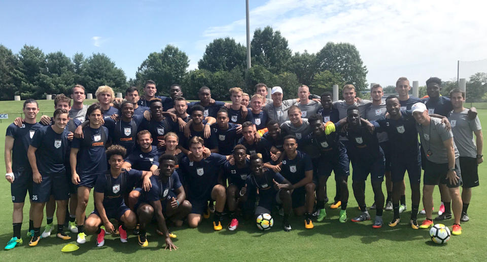 A day after their soccer match was ‘canceled because of the KKK,’ the University of Virginia men’s soccer team came together for this group photo. (UVa Athletics)