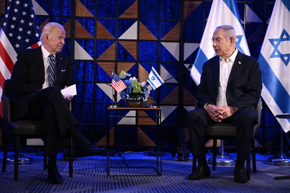 U.S. President Joe Biden and Israeli Prime Minister Benjamin Netanyahu speak prior to their statements and meeting in Tel Aviv on October 18, 2023. (Photo by BRENDAN SMIALOWSKI/AFP via Getty Images)