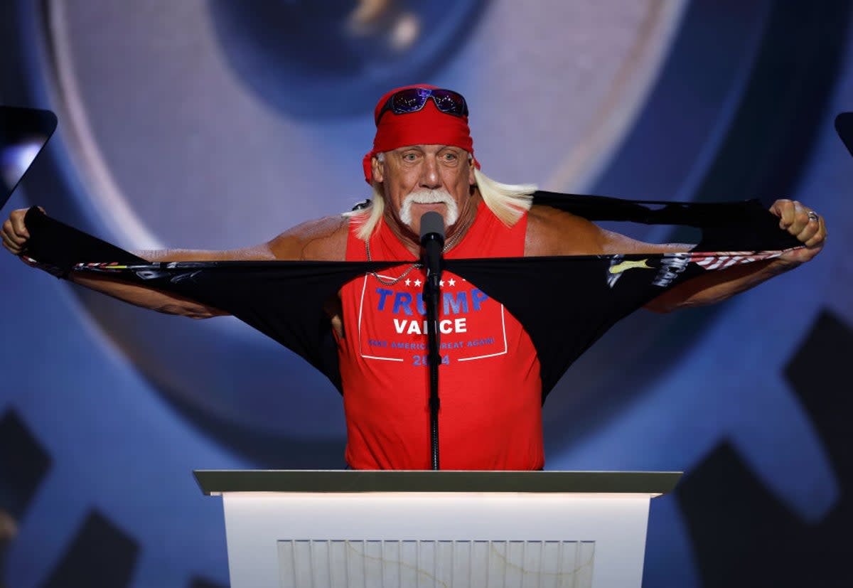 Hulk Hogan, retired wrestling star, rips off his tank top to reveal a Trump/Vance shirt underneath at the RNC on the final night in Milwaukee, Wisconsin (Getty Images)