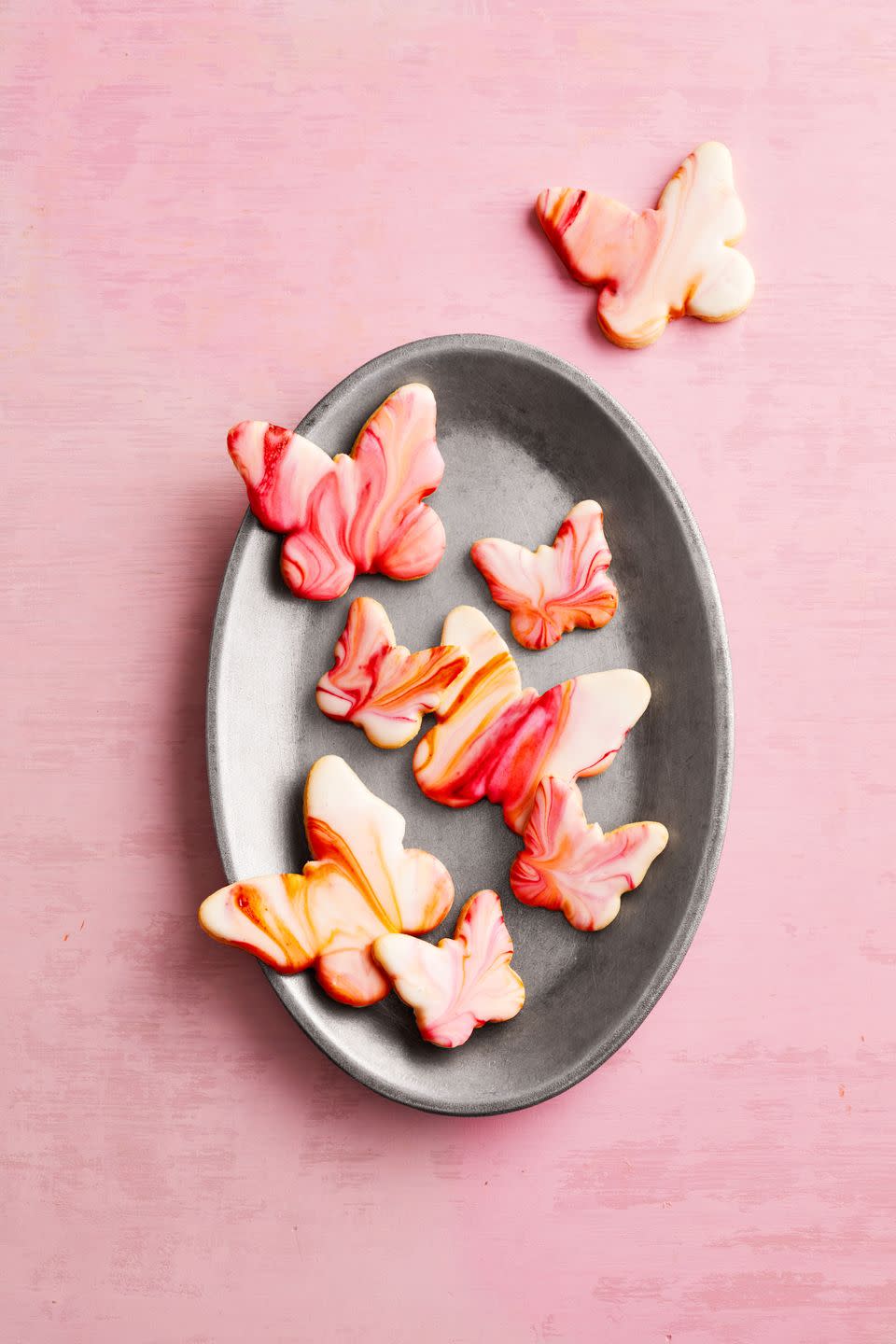 mothers day cookies like butterfly sugar cookies on a metal plate