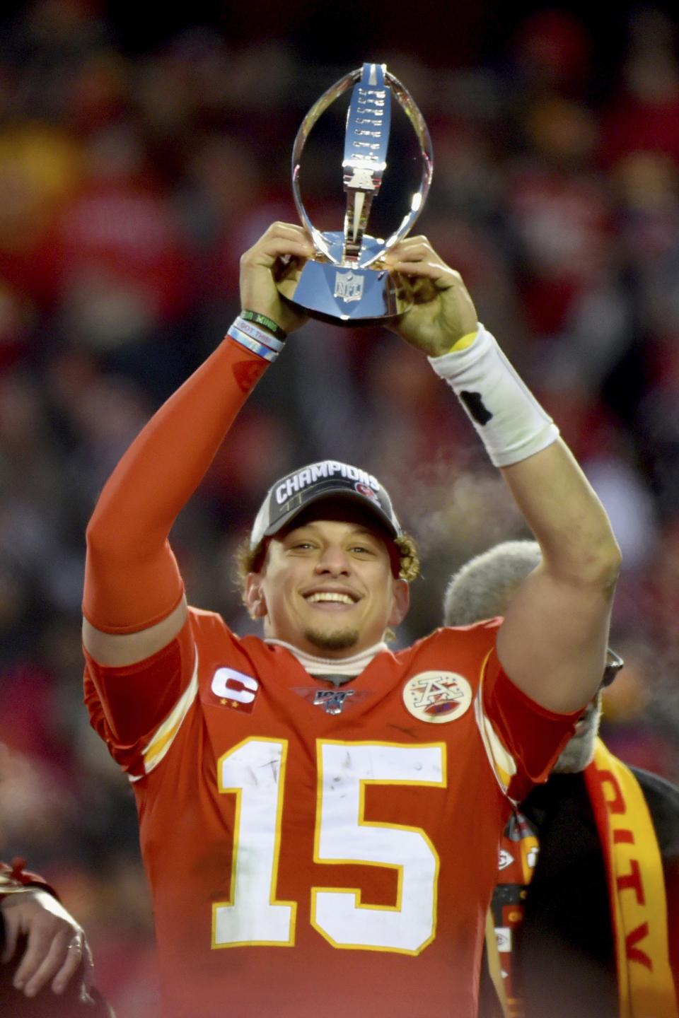 Kansas City Chiefs' Patrick Mahomes holds the Lamar Hunt Trophy after the NFL AFC Championship football game against the Tennessee Titans Sunday, Jan. 19, 2020, in Kansas City, MO. The Chiefs won 35-24 to advance to Super Bowl 54. (AP Photo/Ed Zurga)