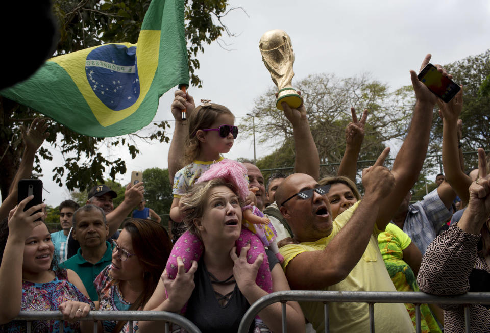 Supporters of Jair Bolsonaro, presidential candidate with the Social Liberal Party, shout slogans during the presidential runoff election in Rio de Janeiro, Brazil, Sunday, Oct. 28, 2018. Bolsonaro is running against leftist candidate Fernando Haddad of the Workers’ Party. (AP Photo/Silvia Izquierdo)