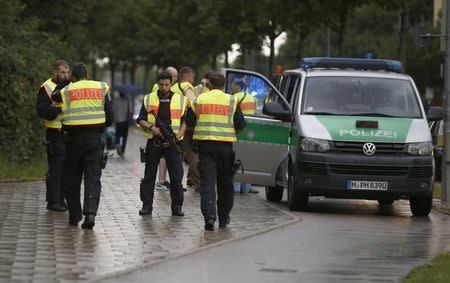 Police secure a street near to the scene of a shooting in Munich, Germany July 22, 2016. REUTERS/Michael Dalder