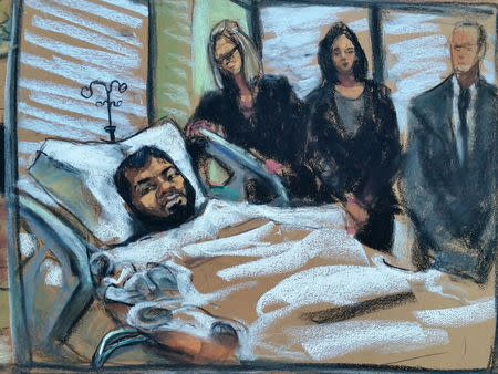 Akayed Ullah, a 27-year-old supporter of the Islamic State militant group, is seen in this courtroom sketch appearing by video for a hearing from his bed in Bellevue Hospital in New York, NY, U.S., December 13, 2017. REUTERS/Jane Rosenberg