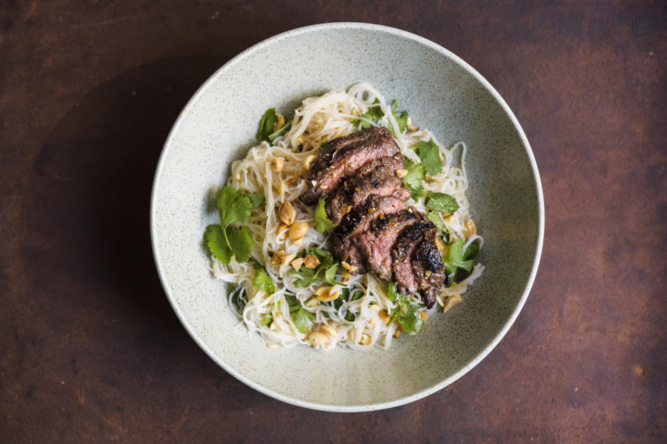 This image released by Milk Street shows a recipe for ginger beef and rice noodle salad. (Milk Street via AP)