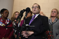 House Judiciary Committee Chairman Jerrold Nadler, D-N.Y., standing with other committee Democrats, talks to reporters following the House Judiciary Committee hearing on Capitol Hill in Washington, Wednesday, Dec. 4, 2019, on the on the constitutional grounds for the impeachment of President Donald Trump. (AP Photo/Susan Walsh)