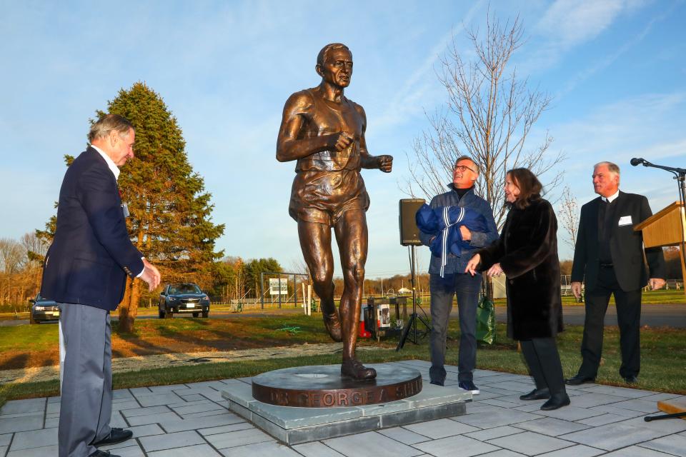 Statue of running-boom icon George Sheehan is unveiled at Christian Brothers Academy