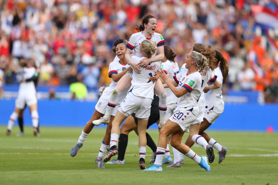 Rose Lavelle celebrates with U.S. teammates